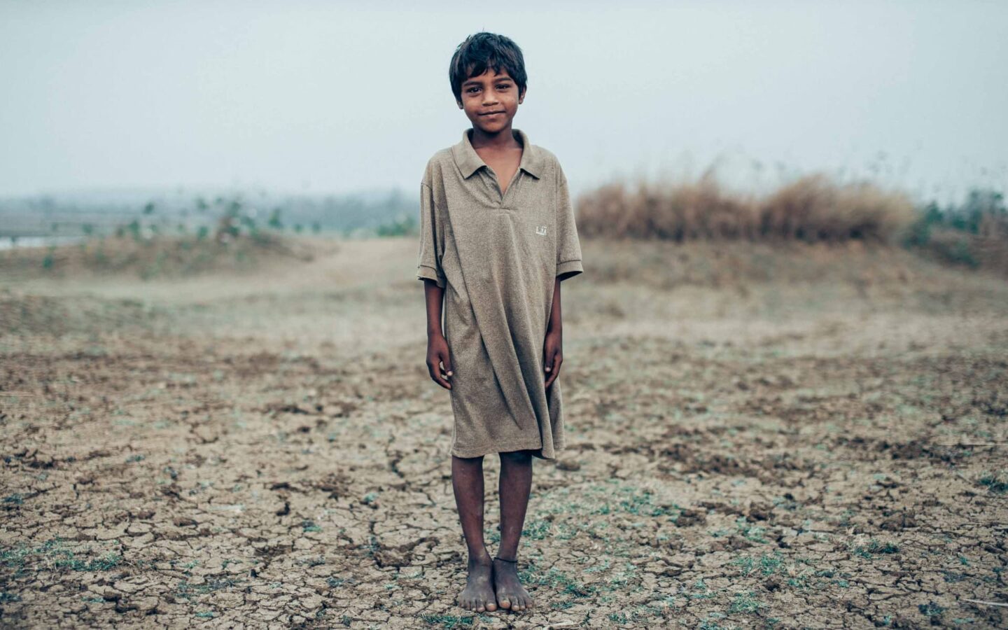 Photograph of a young rural Indian boy supported by Frank Water