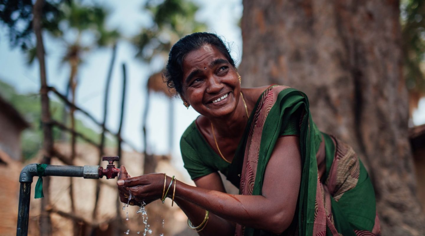 Photograph of a Indian women drinkign water